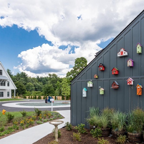 A beautiful community at the heart of all your passions bird houses on the side of a building